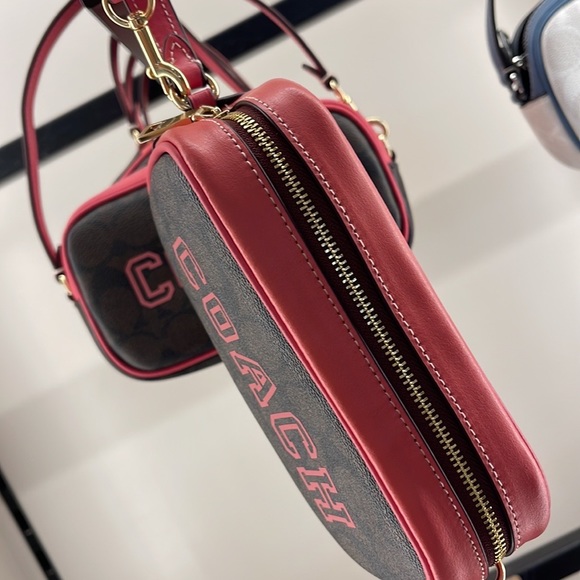 Coach Jamie Wristlet In Signature Canvas With Varsity Motif
IM/Brown/Watermelon - Picture 12 of 16